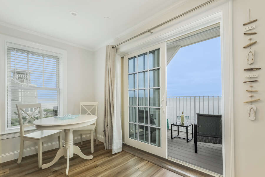 Bistro table and sliders to balcony overlooking the Ocean - 405 Old Wharf Road-Dennisport Cape Cod- New England Vacation Rentals