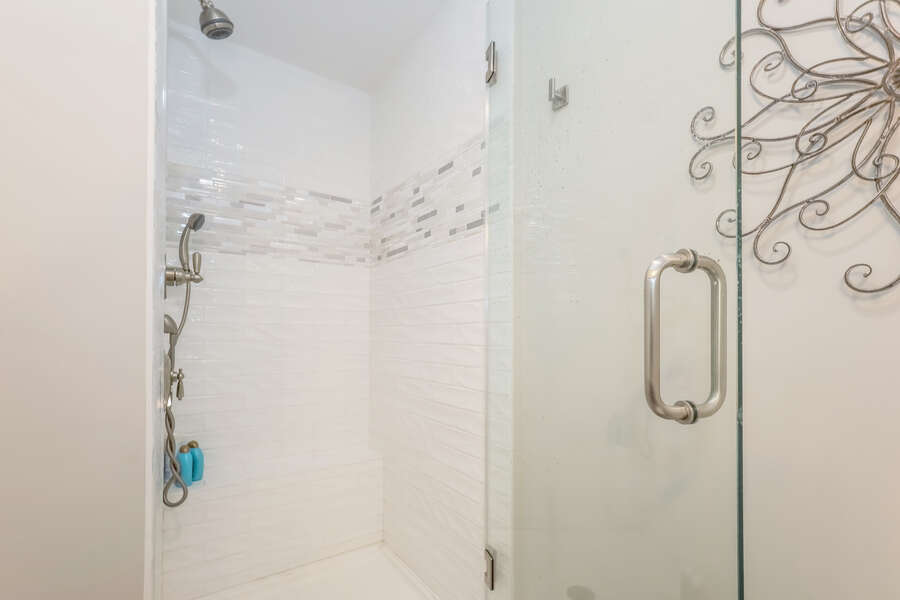 En-suite full bathroom with glass enclosed shower - 405 Old Wharf Road-Dennisport Cape Cod- New England Vacation Rentals