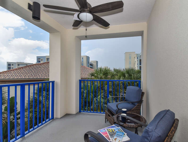 Balcony of our Condo rental in New Smyrna Beach seating 2