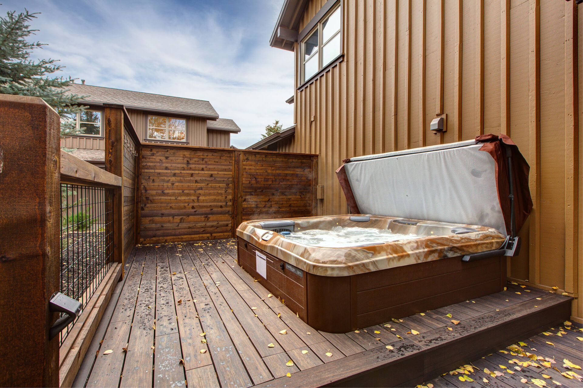 Brand new private deck with hot tub, patio table, & BBQ