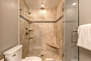 Master Bathroom with dual sinks and large rain shower
