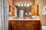 Master Bathroom Features Dual Sinks and a Tub/Shower Combo