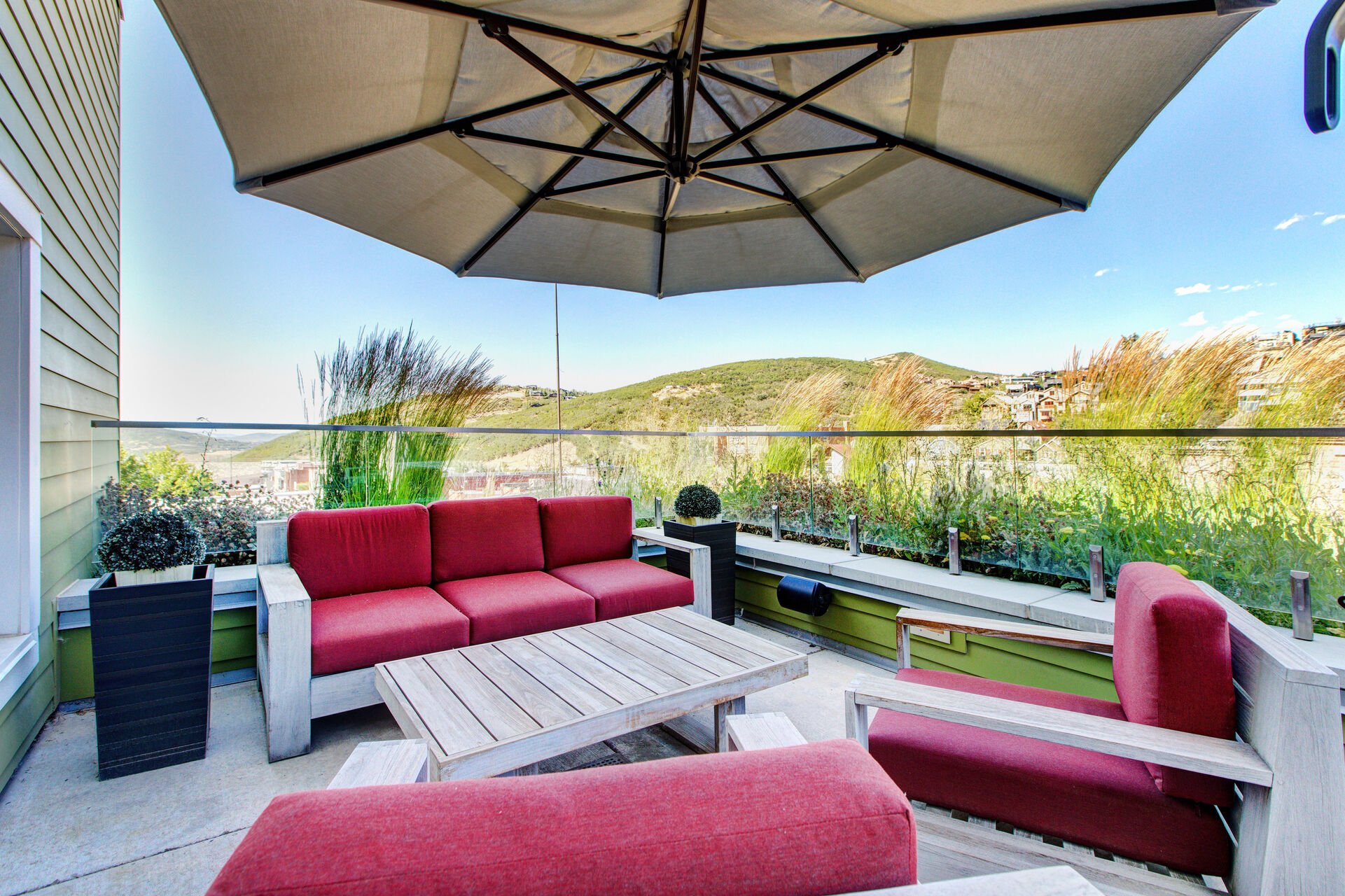 Patio Furnishings and a Sonos Speaker to Enjoy the Fresh Mountain Air and Views