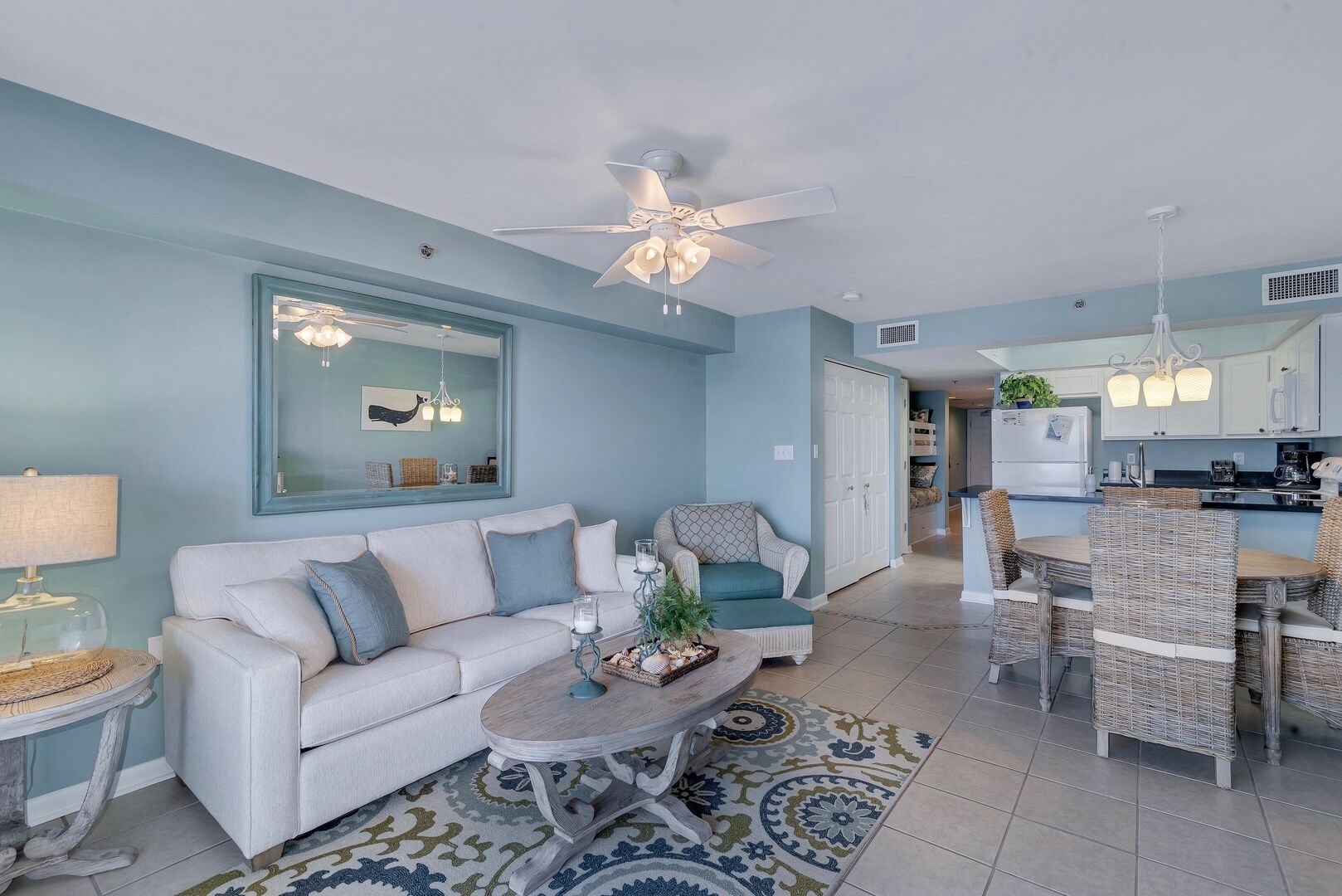 Spacious Living Area with views of the Beautiful Gulf of Mexico and access to Private Balcony and Full Size Sleeper Sofa
