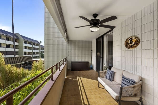 Spacious Lanai with Ceiling Fan and Outdoor Sofa