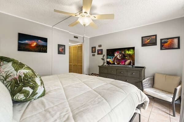 Large Bed, Drawer Dresser, Smart TV, and Ceiling Fan