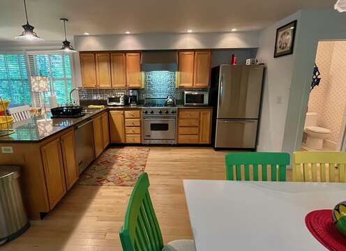 Appliances include a Viking 4 burner gas stove, dishwasher, drip coffee maker, toaster oven and microwave.