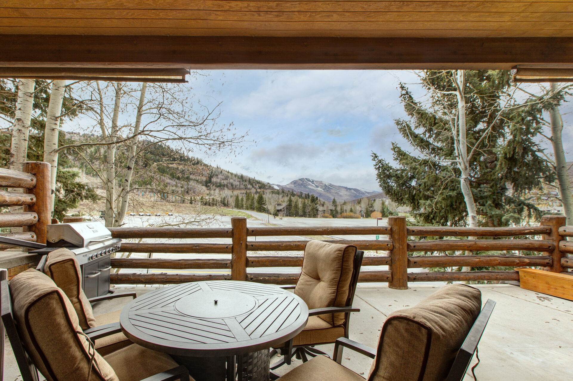Private Hot Tub Patio with seating for four, propane fire pit, BBQ grill, and breathtaking views of Deer Valley