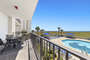 Beautiful sun drenched Private Balcony Overlooking the Pool and the Gulf of Mexico