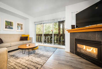 Cozy living room w/ gas fireplace & smart TV