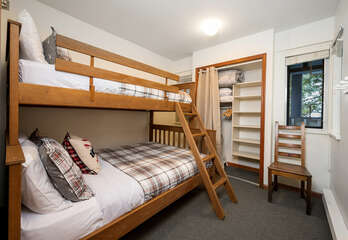 Third bedroom with single over double bunk