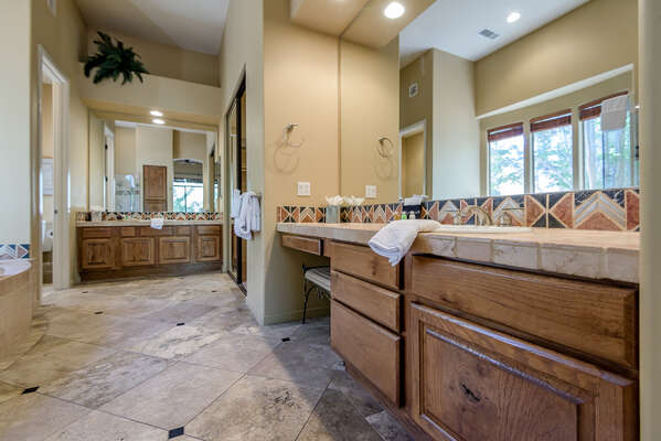 Huge Master Bath with Separate Vanities and a Make-up Area