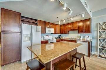 Very large kitchen with huge island for cooking and eating