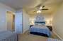 1st guest bedroom features a queen bed and 2 twin beds with 3 nightstands