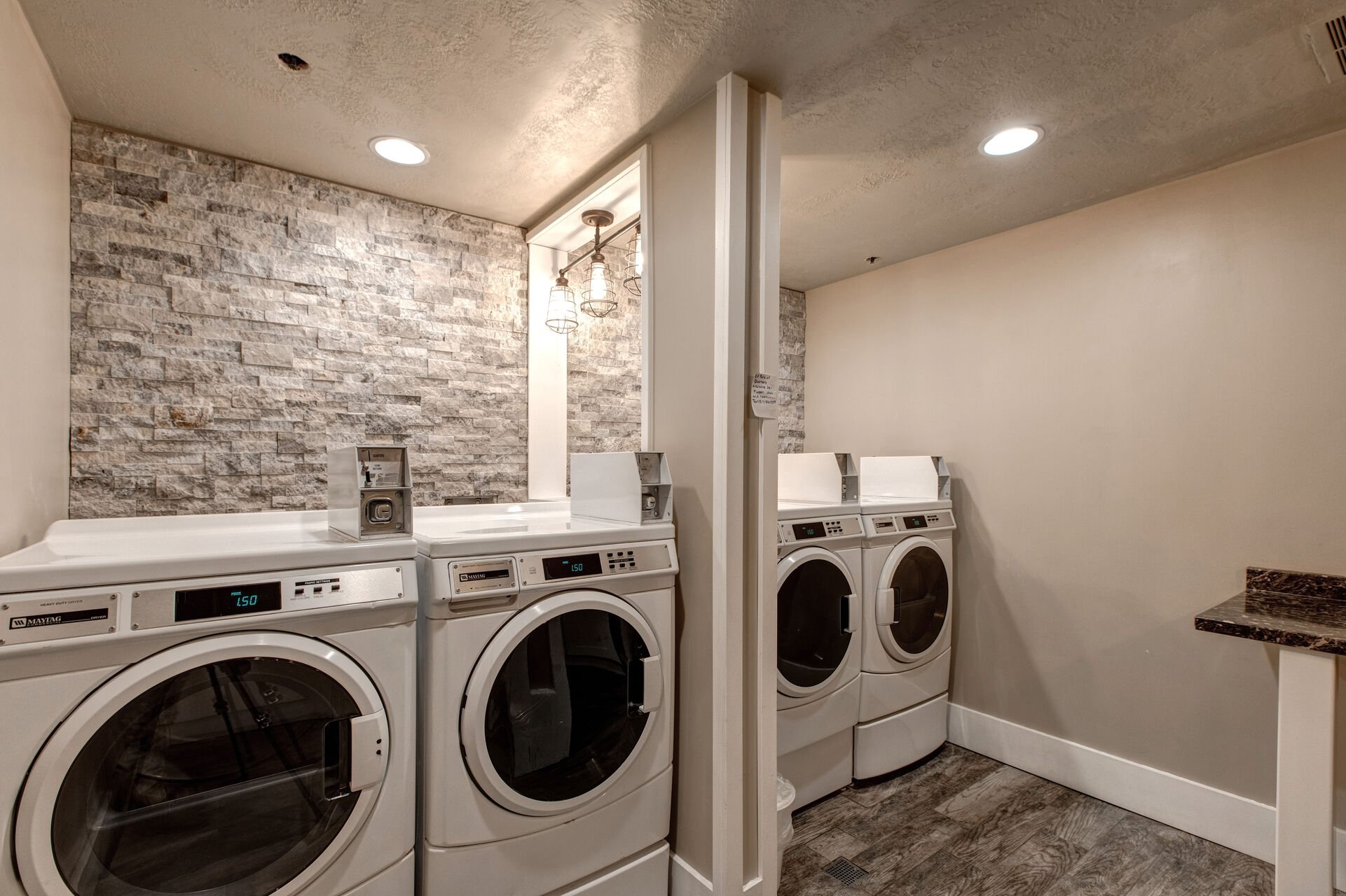 Communal Laundry Room with Coin-Operated Washers and Dryers