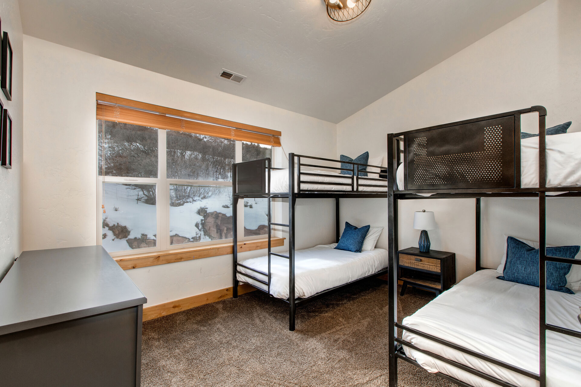 Upper Level Bedroom 4 with two twin over twin bunk beds and en suite bathroom