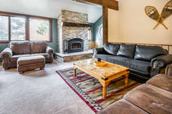 Living Room - 65 inch smart tv and Blu-ray player, sleeper sofa, wood burning fireplace