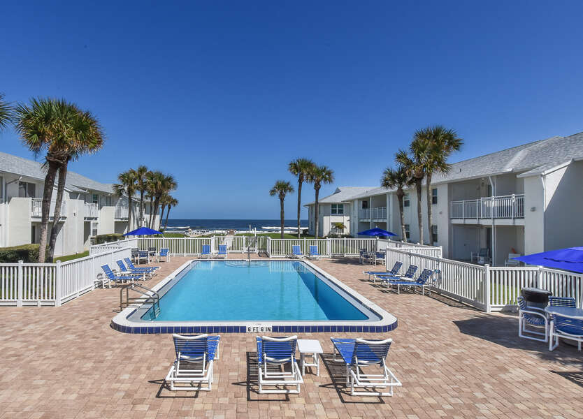 Large pool area in the middle of our condo for rent new smyrna beach