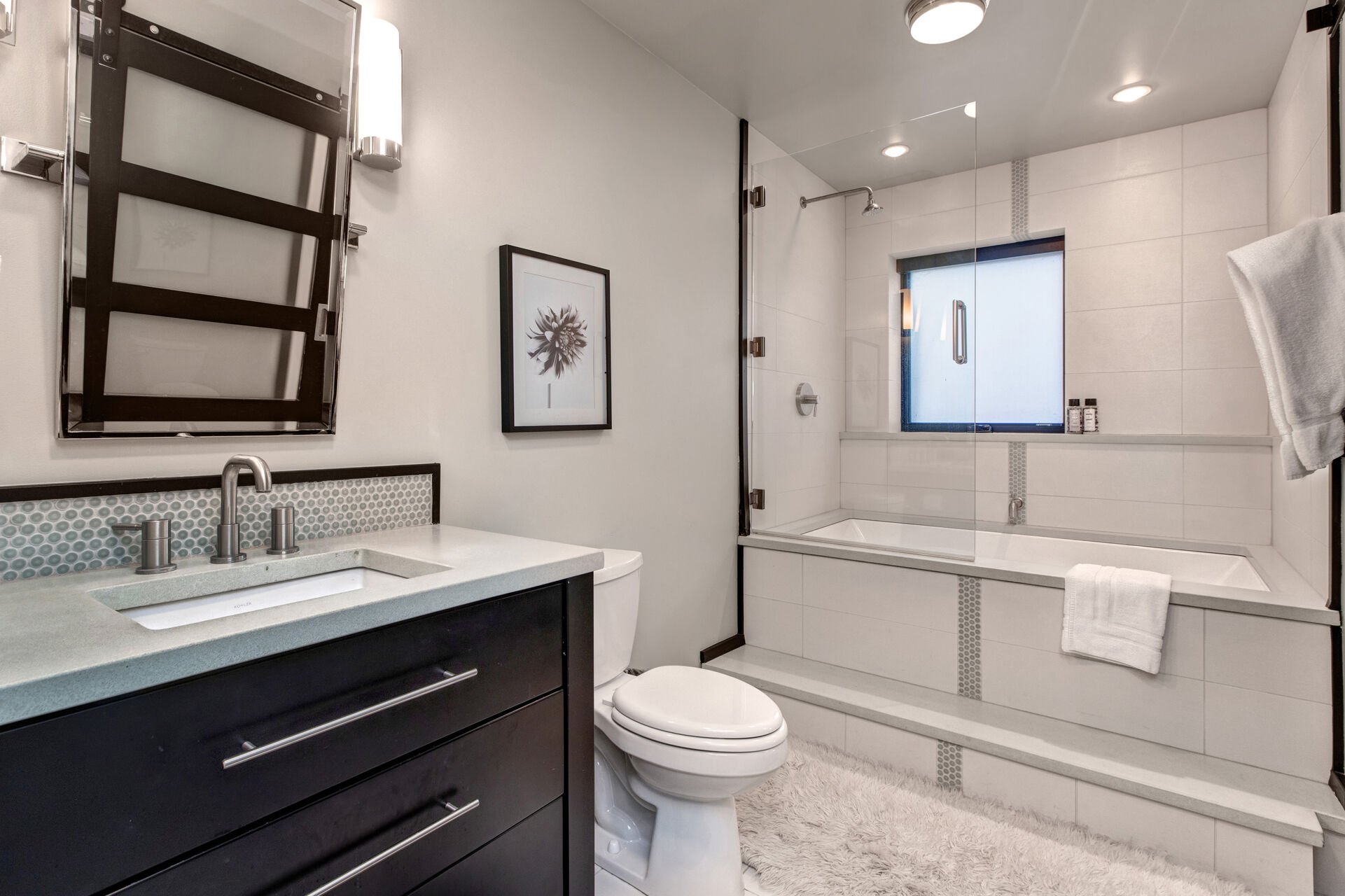 Master Bathroom with tub/shower combo and walk-in closet