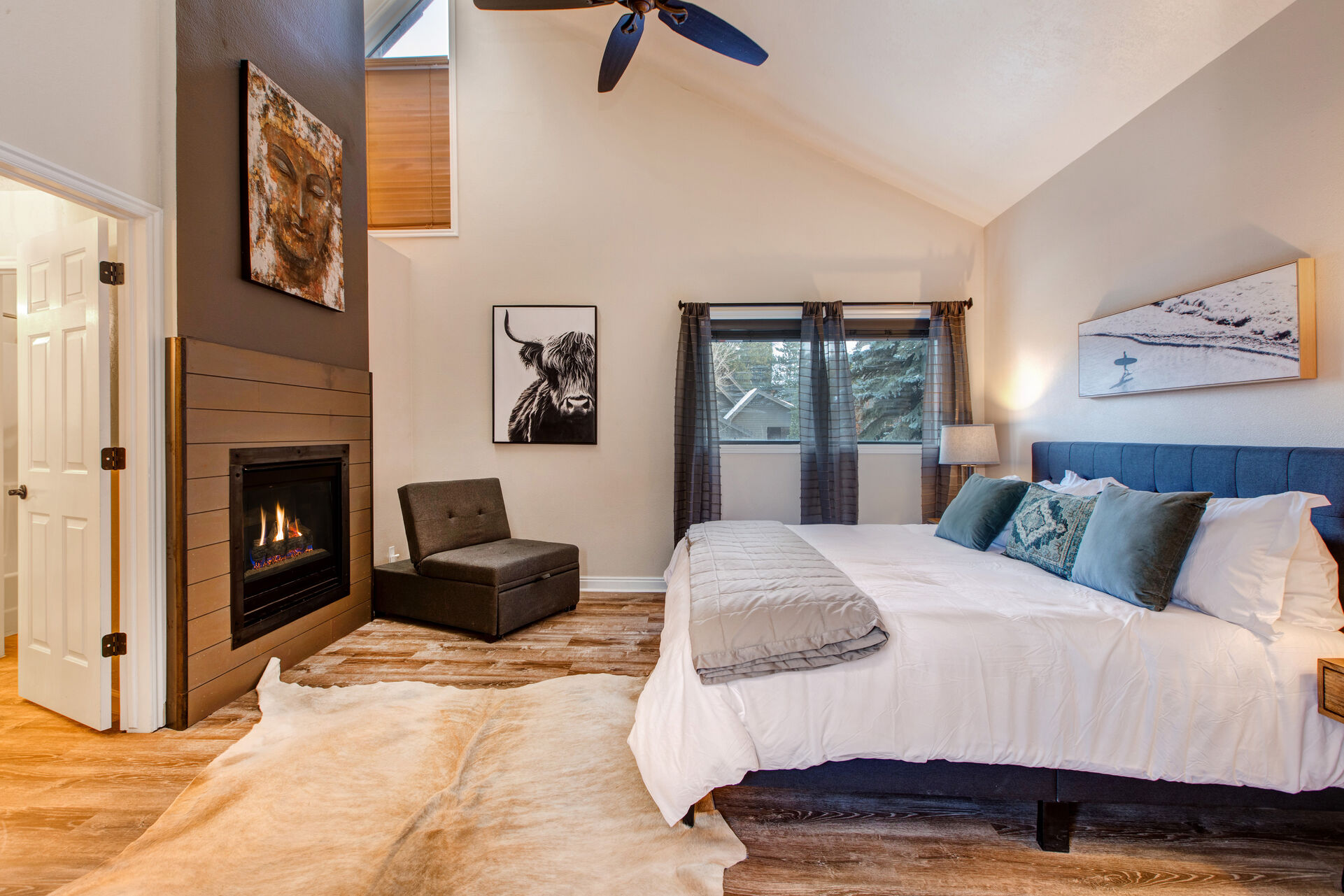 Master Bedroom with vaulted ceilings, king bed, gas fireplace, 40