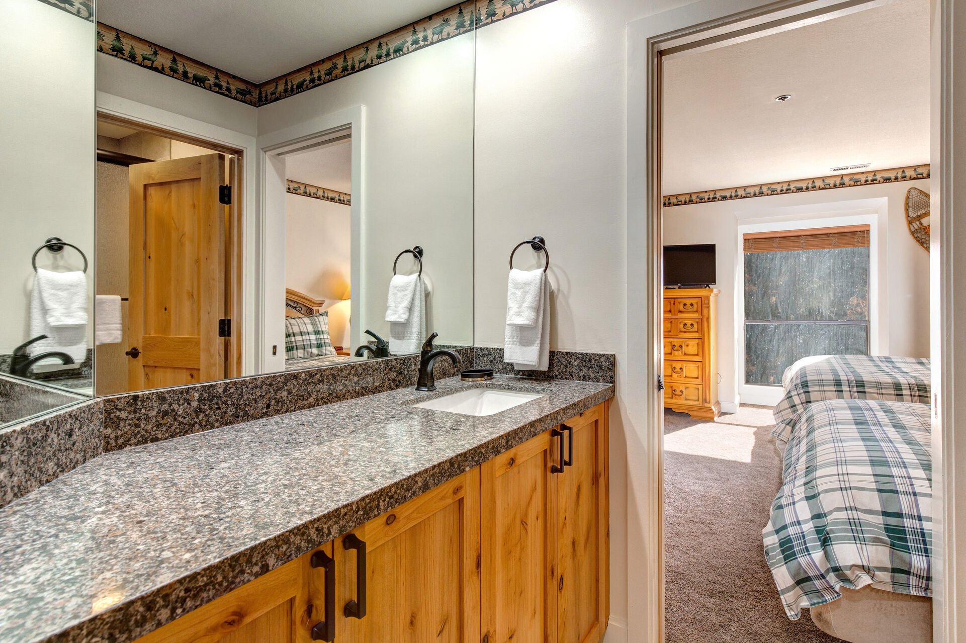 Bedroom 2 Private Access to a Full Shared Bath with a Stone Counter Sink