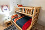 Bedroom 3 with twin over queen bunk and shared full bath