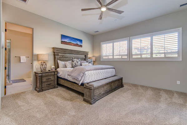 Master Bedroom with a King Bed with Plenty of Natural Light