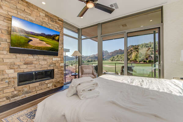 Master Bedroom with a King Bed and Plenty of Natural Light and Stunning Views