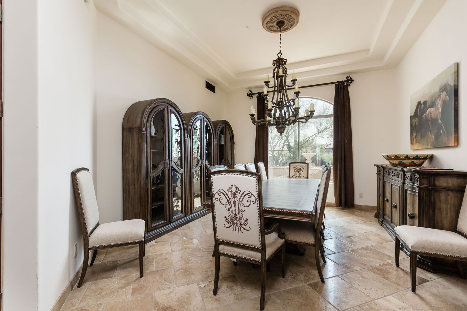 Formal Dining Room offering a table to accommodate 10 guests perfect for a holiday family feast.