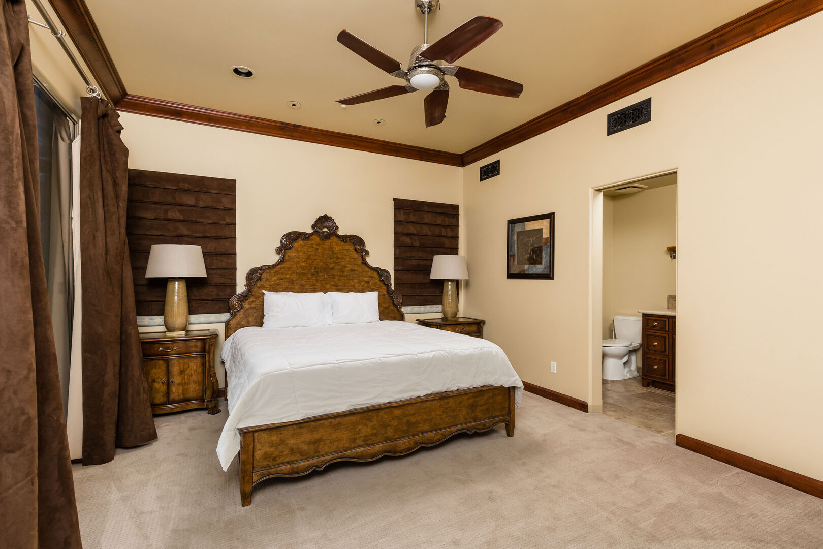 3rd Bedroom featuring a King Bed, bedroom furnishings, and a Smart TV with an ensuite Bathroom.
