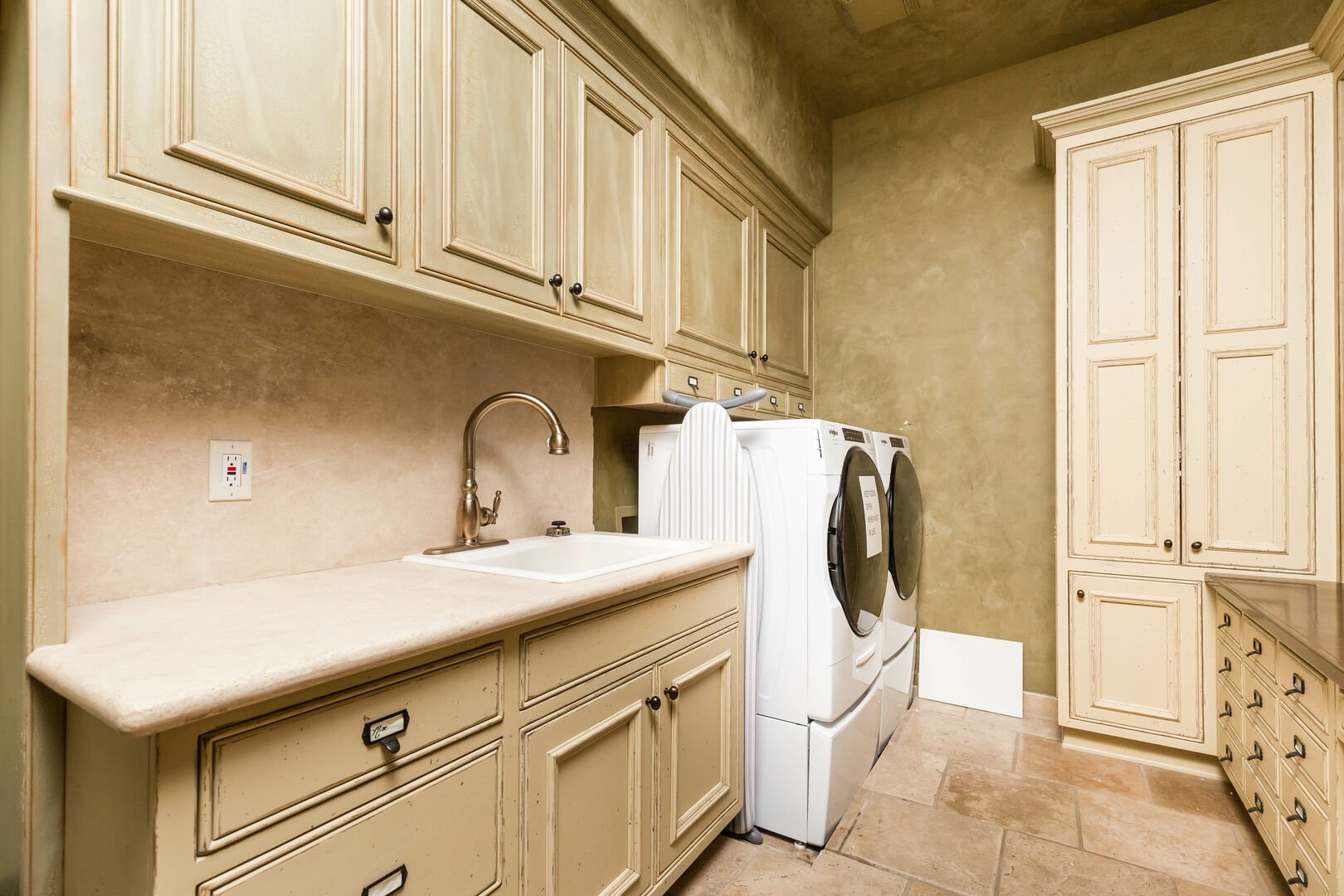 Laundry room with a washer and dryer available for use during your stay.