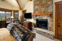 Master bedroom with gas fireplace and TV