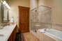 Soaking tub and large shower in the master bath
