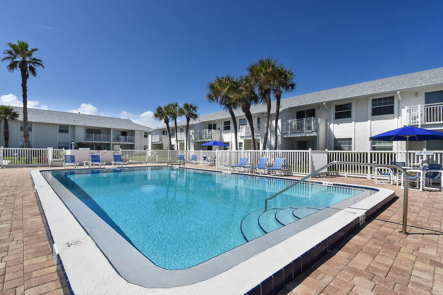 Large pool area in our condo rental in New Smyrna Beach