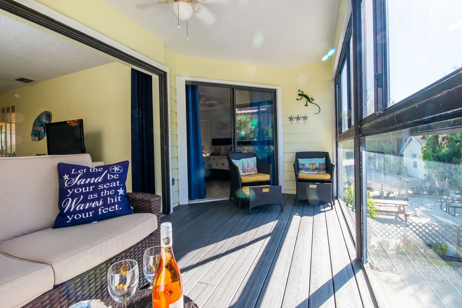 Beach Potato screened in balcony with slider door access off master bedroom