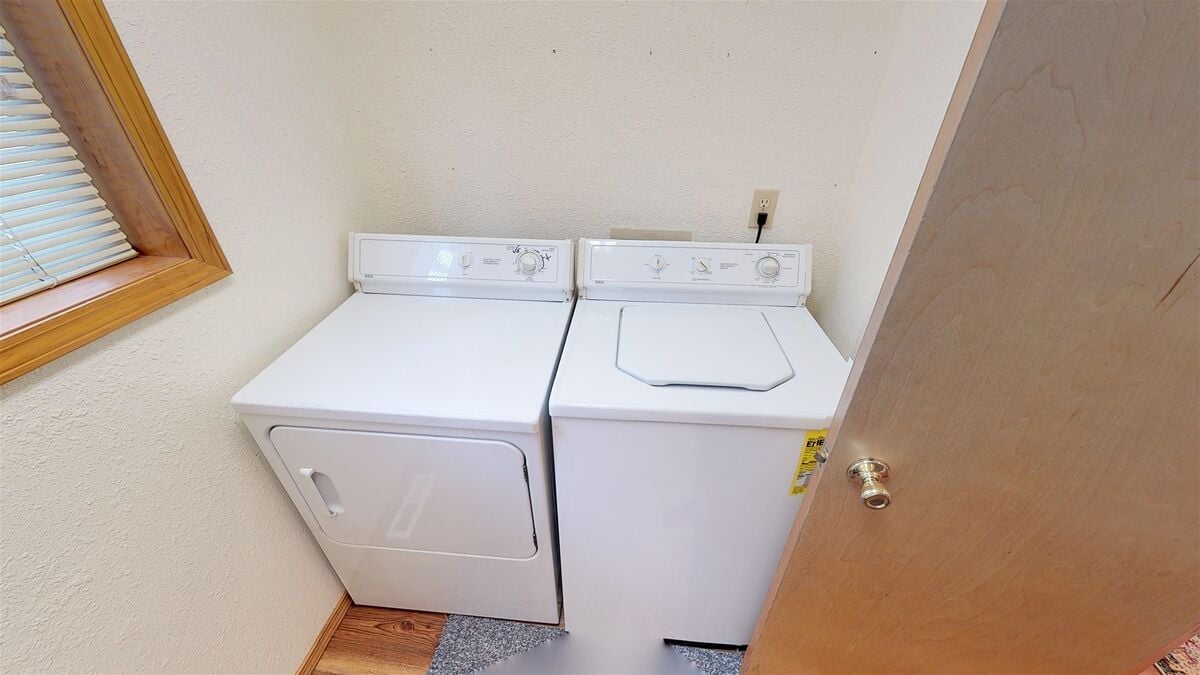 Laundry area off of kitchen.