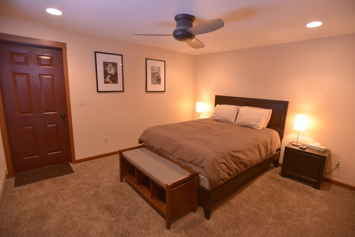 Main level bedroom with Queen bed.