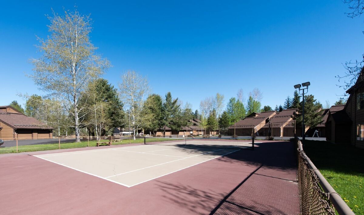 Get your game on - tennis court on site.