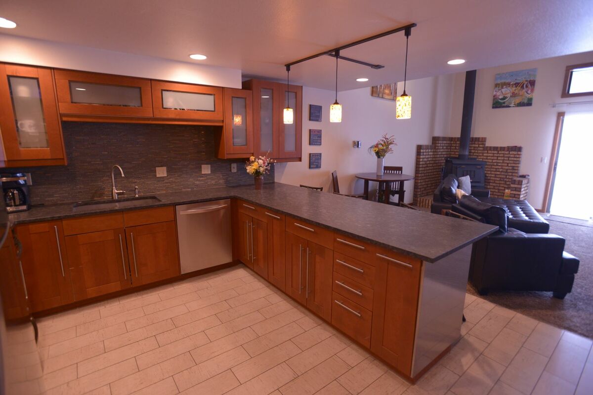 Kitchen and living area - well lit.