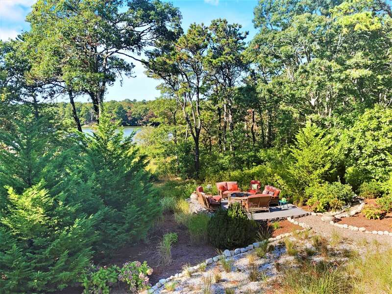 Views of the lower fire pit overlooking Aunt Edie's Pond-10 Cranberry Hollow Harwich-Cape Cod- New England Vacation Rentals-#BookNEVRDirectArtfulView