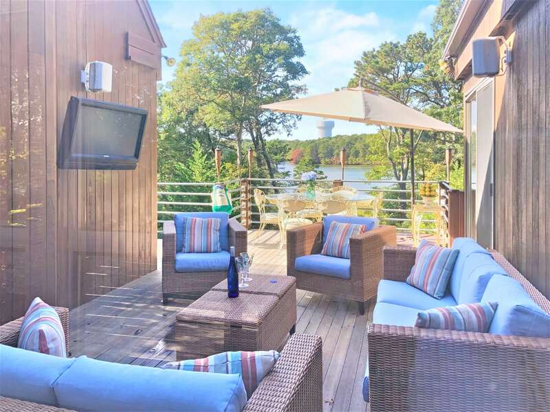 Relax and watch the game in this great outdoor entertainment area on the upper deck.- 10 Cranberry Hollow Harwich-Cape Cod- New England Vacation Rentals-#BookNEVRDirectArtfulView