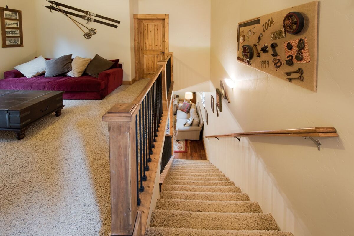 Carpeted stairwell to main level.