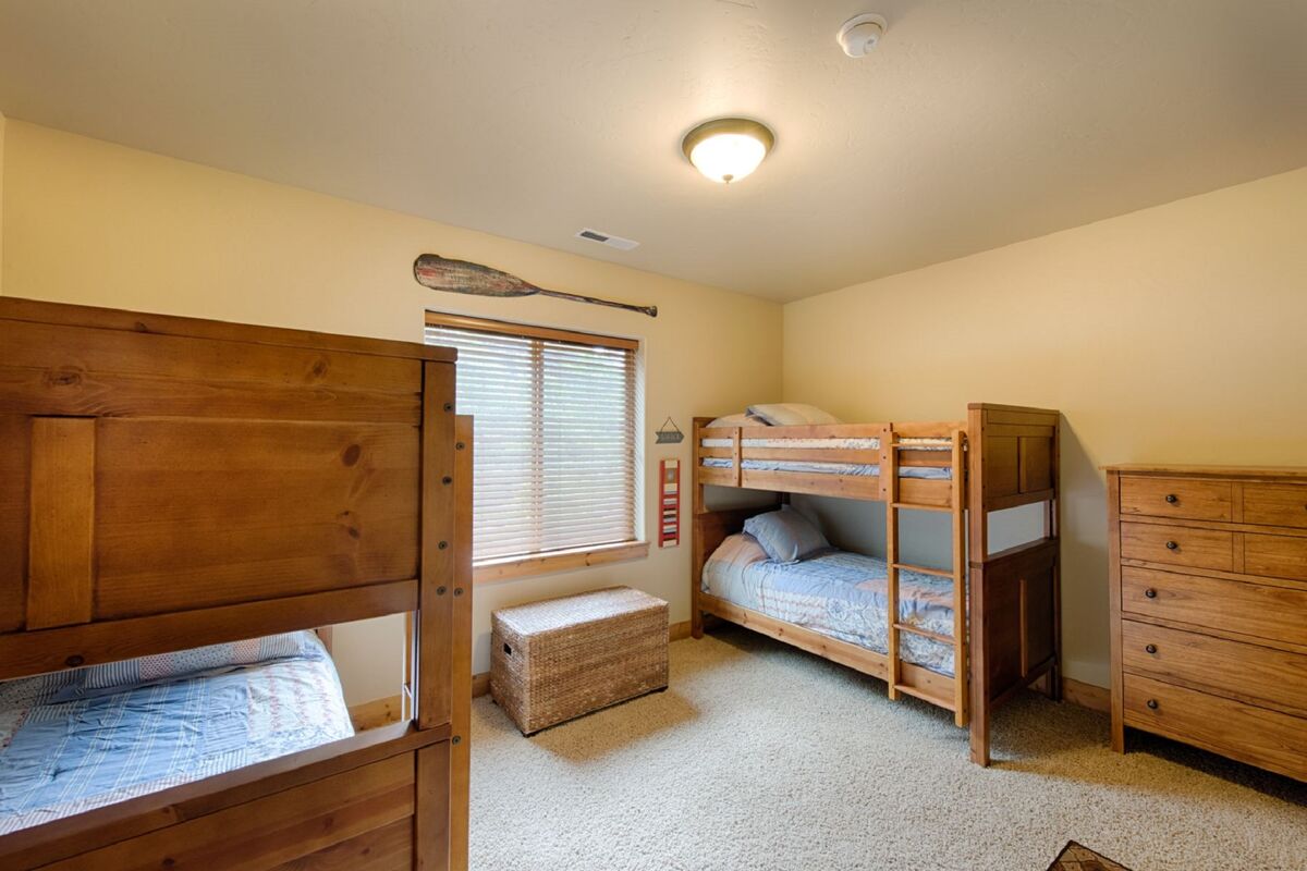 Bunk room has two sets of twin over twin, quality beds.