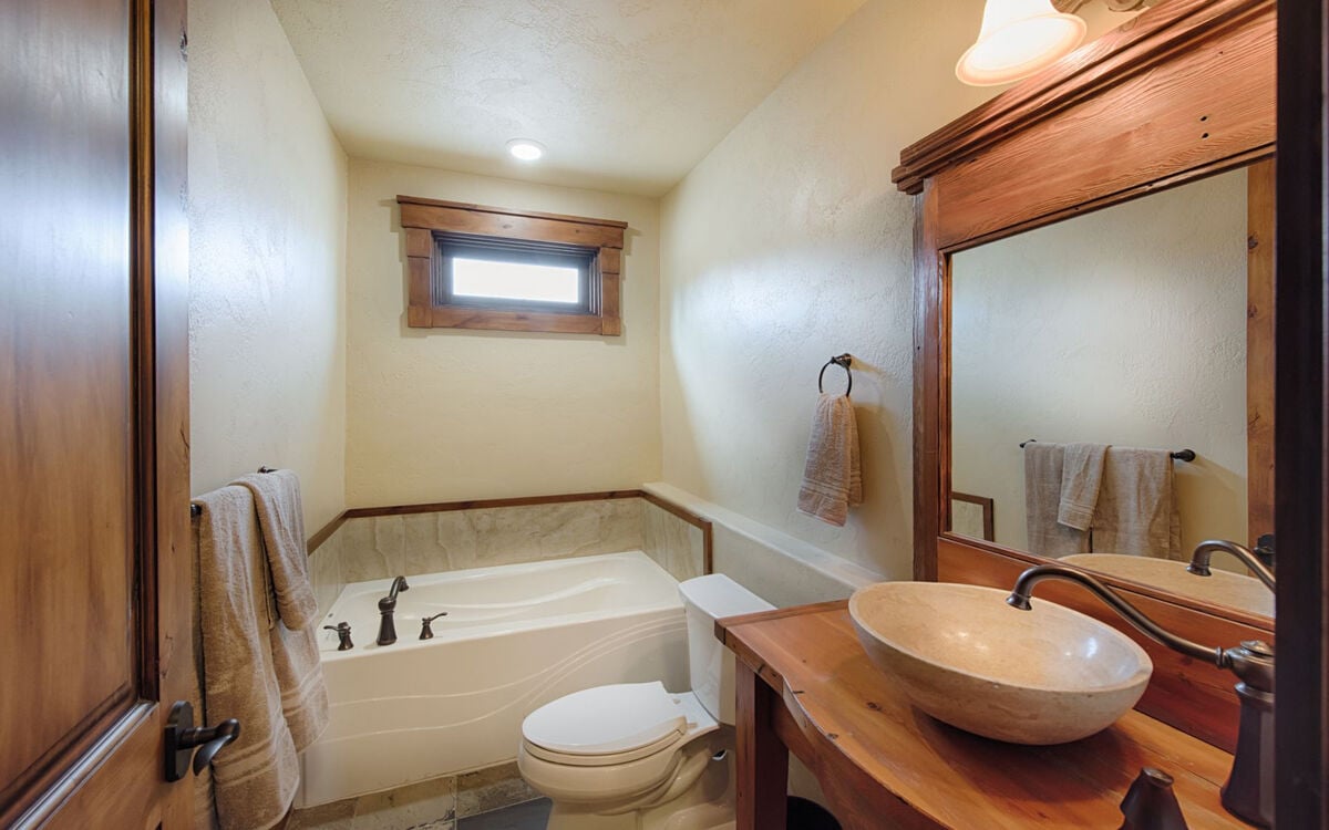 Guest bathroom with hall access.