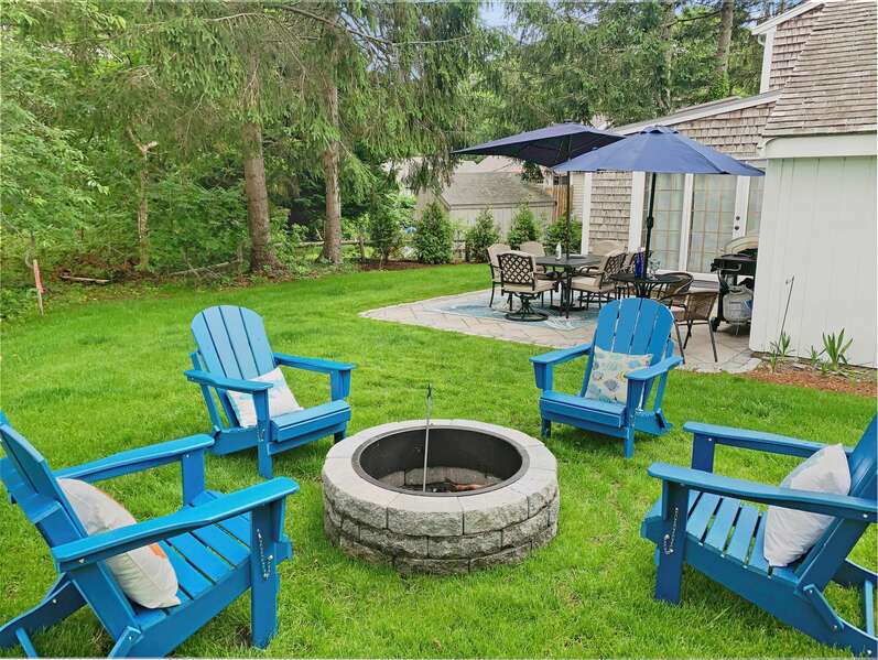 Gather around the fire pit at - 2 Cove Road Harwich Cape Cod - New England Vacation Rentals- #BookNEVRDirectCozyCove