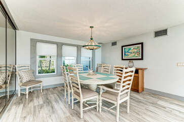 Dining area for 10, with  the addition of the kitchen bar space, you can easily seat 12 for a family meal!