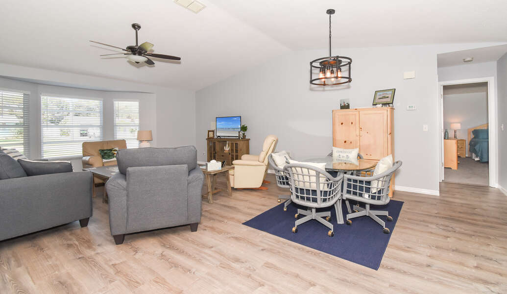 living room space and small dining area new smyrna beach home rental
