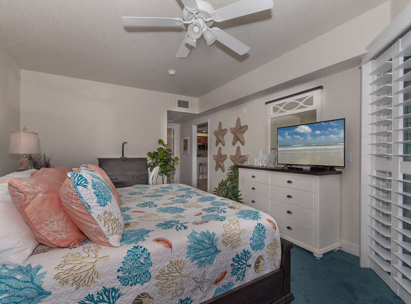 bedroom fully furnished with tv in condo rental in new smyrna beach