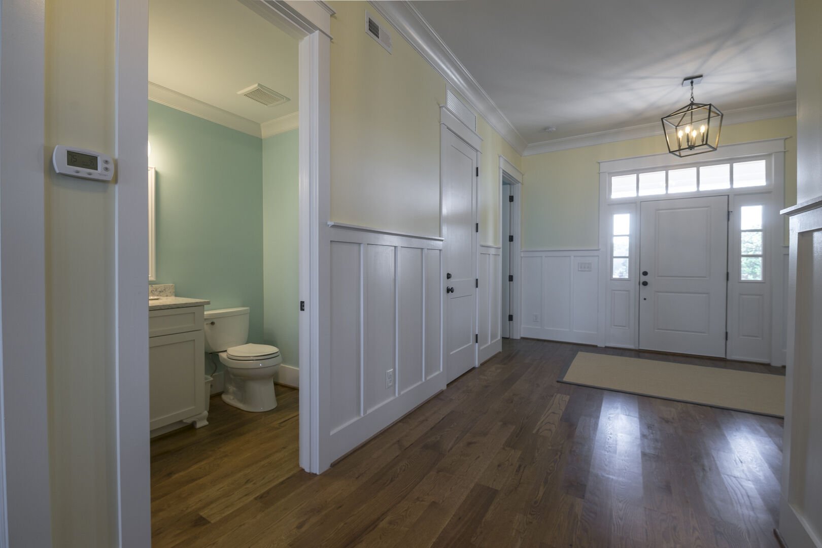 Half Bathroom and Foyer - First Floor