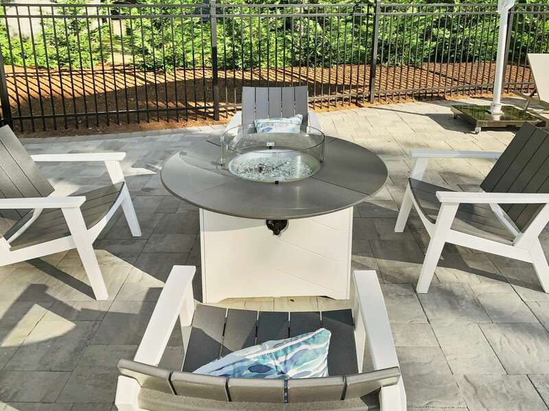 Fire pit by the pool at-31 Pine Rd West Dennis- Cape Cod- New England Vacation Rentals
